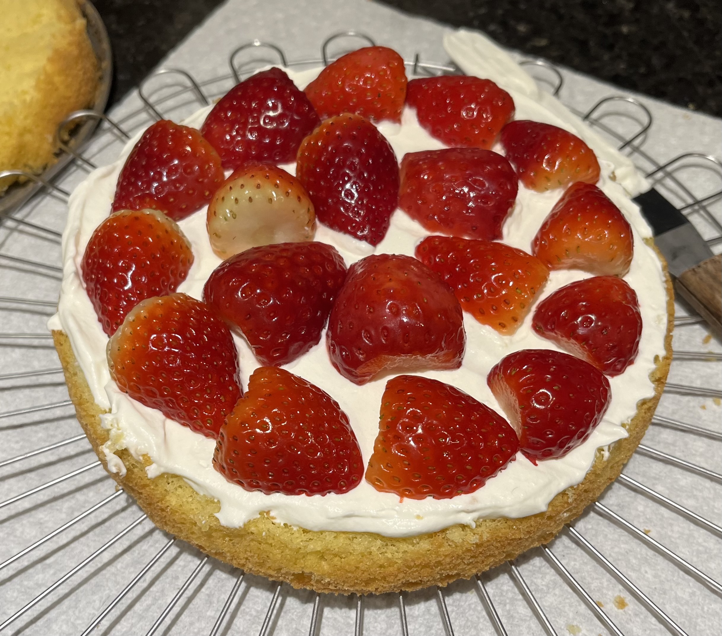 cake (the middle layer, with whipped cream and strawberries)