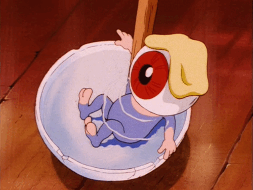 Medama-Oyaji from Gegege no Kitaro taking a bath in a small bowl, being stirred with a chopstick
